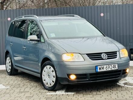 Синий Фольксваген Туран, объемом двигателя 2 л и пробегом 257 тыс. км за 3450 $, фото 1 на Automoto.ua