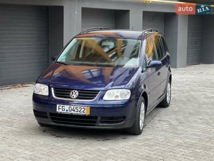 Синій Фольксваген Туран, об'ємом двигуна 1.6 л та пробігом 240 тис. км за 6700 $, фото 1 на Automoto.ua