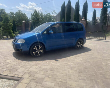 Синій Фольксваген Туран, об'ємом двигуна 1.39 л та пробігом 200 тис. км за 4400 $, фото 1 на Automoto.ua