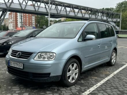Фольксваген Туран 2006 в Тернополе на Automoto.ua Синий Фольксваген Туран, объемом двигателя 1.6 л и пробегом 168 тыс. км за 5700 $, фото 1 на Automoto.ua