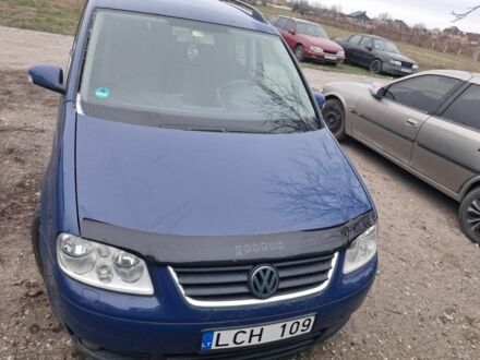 Синий Фольксваген Туран, объемом двигателя 2 л и пробегом 200 тыс. км за 2200 $, фото 1 на Automoto.ua