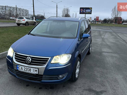 Синий Фольксваген Туран, объемом двигателя 1.4 л и пробегом 223 тыс. км за 6999 $, фото 1 на Automoto.ua