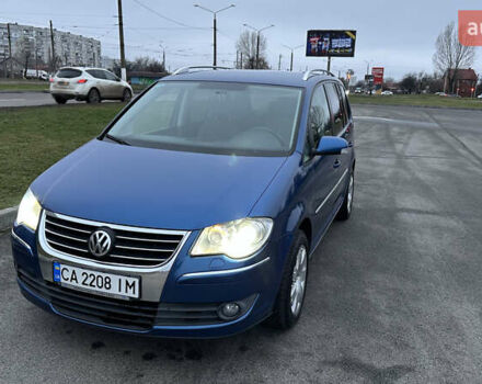 Синий Фольксваген Туран, объемом двигателя 1.4 л и пробегом 223 тыс. км за 6999 $, фото 1 на Automoto.ua