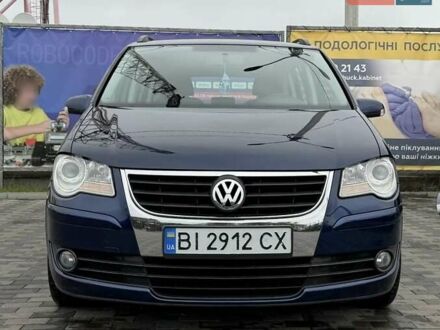 Синій Фольксваген Туран, об'ємом двигуна 1.4 л та пробігом 203 тис. км за 6700 $, фото 1 на Automoto.ua