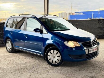 Синий Фольксваген Туран, объемом двигателя 1.4 л и пробегом 241 тыс. км за 6399 $, фото 1 на Automoto.ua