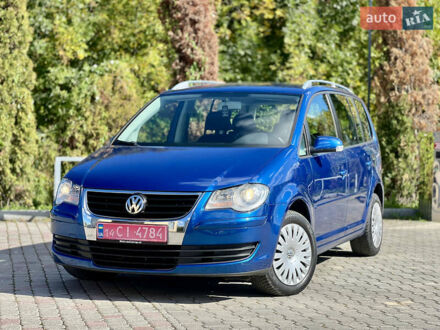 Синий Фольксваген Туран, объемом двигателя 1.4 л и пробегом 260 тыс. км за 6750 $, фото 1 на Automoto.ua
