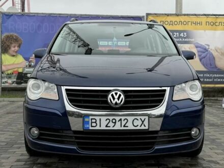 Синій Фольксваген Туран, об'ємом двигуна 1.4 л та пробігом 203 тис. км за 7822 $, фото 1 на Automoto.ua