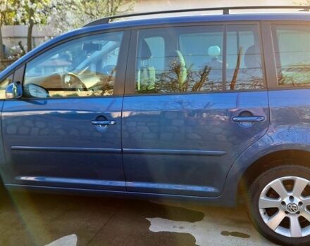 Синий Фольксваген Туран, объемом двигателя 1.9 л и пробегом 250 тыс. км за 7500 $, фото 1 на Automoto.ua