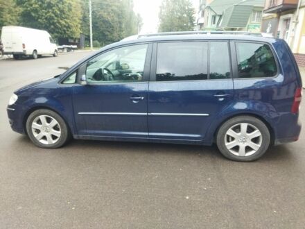 Синий Фольксваген Туран, объемом двигателя 2 л и пробегом 244 тыс. км за 5350 $, фото 1 на Automoto.ua