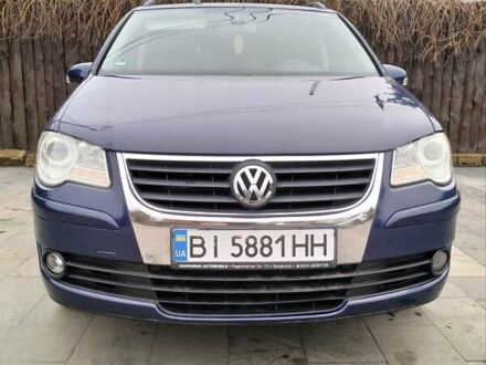 Синий Фольксваген Туран, объемом двигателя 1.39 л и пробегом 230 тыс. км за 6800 $, фото 1 на Automoto.ua