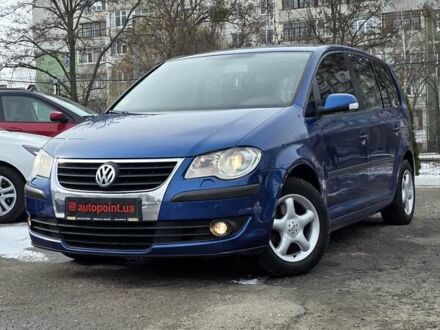 Фольксваген Туран 2007 в Сумах на Automoto.ua Синий Фольксваген Туран, объемом двигателя 1.4 л и пробегом 260 тыс. км за 5800 $, фото 1 на Automoto.ua