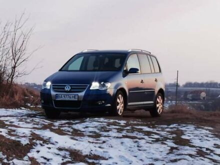 Фольксваген Туран 2008 в Александрие на Automoto.ua Синий Фольксваген Туран, объемом двигателя 1.4 л и пробегом 160 тыс. км за 9000 $, фото 1 на Automoto.ua