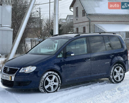 Синий Фольксваген Туран, объемом двигателя 1.4 л и пробегом 227 тыс. км за 7400 $, фото 1 на Automoto.ua