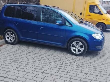 Синий Фольксваген Туран, объемом двигателя 1.39 л и пробегом 170 тыс. км за 7500 $, фото 1 на Automoto.ua