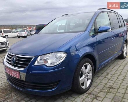 Синий Фольксваген Туран, объемом двигателя 1.6 л и пробегом 209 тыс. км за 7598 $, фото 1 на Automoto.ua