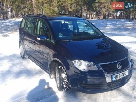 Синий Фольксваген Туран, объемом двигателя 1.4 л и пробегом 205 тыс. км за 7500 $, фото 1 на Automoto.ua