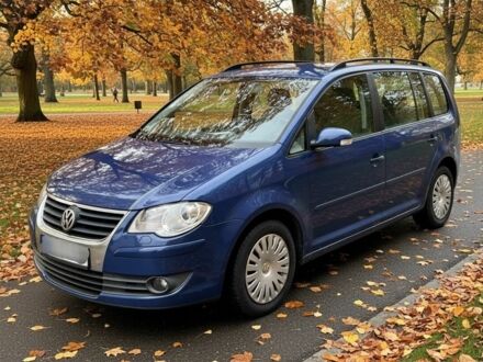 Синий Фольксваген Туран, объемом двигателя 1.4 л и пробегом 188 тыс. км за 450 $, фото 1 на Automoto.ua