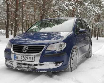 Синий Фольксваген Туран, объемом двигателя 1.4 л и пробегом 240 тыс. км за 6200 $, фото 1 на Automoto.ua