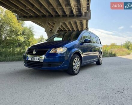 Синій Фольксваген Туран, об'ємом двигуна 1.4 л та пробігом 241 тис. км за 5999 $, фото 1 на Automoto.ua