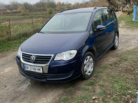 Синий Фольксваген Туран, объемом двигателя 1.39 л и пробегом 190 тыс. км за 6500 $, фото 1 на Automoto.ua