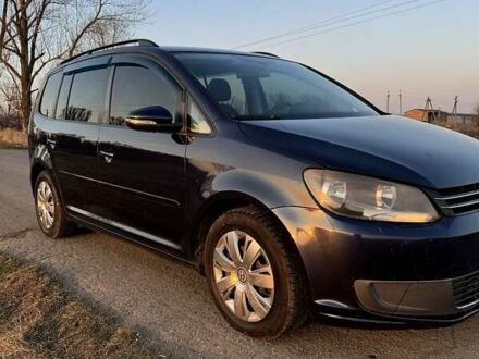 Фольксваген Туран 2011 в Днепре (Днепропетровске) на Automoto.ua Синий Фольксваген Туран, объемом двигателя 1.6 л и пробегом 230 тыс. км за 9000 $, фото 1 на Automoto.ua