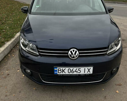 Синій Фольксваген Туран, об'ємом двигуна 1.6 л та пробігом 233 тис. км за 12100 $, фото 1 на Automoto.ua