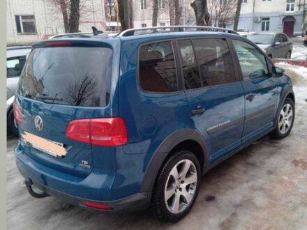 Синий Фольксваген Туран, объемом двигателя 1.4 л и пробегом 230 тыс. км за 8800 $, фото 1 на Automoto.ua