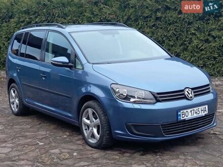 Синий Фольксваген Туран, объемом двигателя 1.2 л и пробегом 160 тыс. км за 7650 $, фото 1 на Automoto.ua