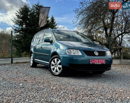 Зеленый Фольксваген Туран, объемом двигателя 1.6 л и пробегом 186 тыс. км за 5150 $, фото 1 на Automoto.ua