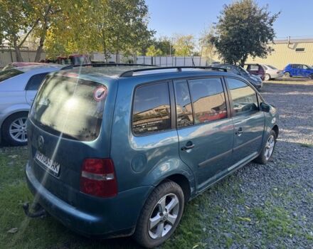 Зеленый Фольксваген Туран, объемом двигателя 1.9 л и пробегом 230 тыс. км за 1950 $, фото 1 на Automoto.ua