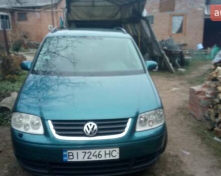 Зеленый Фольксваген Туран, объемом двигателя 1.9 л и пробегом 328 тыс. км за 6000 $, фото 1 на Automoto.ua