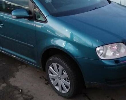 Зеленый Фольксваген Туран, объемом двигателя 1.9 л и пробегом 328 тыс. км за 6000 $, фото 2 на Automoto.ua