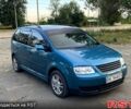 Зелений Фольксваген Туран, об'ємом двигуна 1.6 л та пробігом 217 тис. км за 5300 $, фото 1 на Automoto.ua