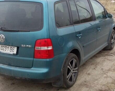 Зеленый Фольксваген Туран, объемом двигателя 2 л и пробегом 200 тыс. км за 4199 $, фото 3 на Automoto.ua