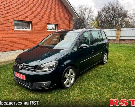 Зеленый Фольксваген Туран, объемом двигателя 2 л и пробегом 282 тыс. км за 10700 $, фото 1 на Automoto.ua