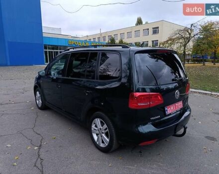 Зеленый Фольксваген Туран, объемом двигателя 1.4 л и пробегом 180 тыс. км за 12200 $, фото 2 на Automoto.ua