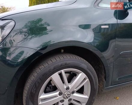 Зеленый Фольксваген Туран, объемом двигателя 1.4 л и пробегом 180 тыс. км за 12200 $, фото 1 на Automoto.ua