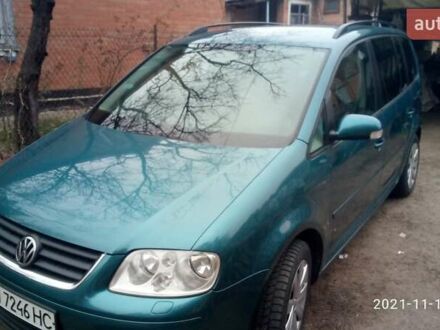 Зелений Фольксваген Туран, об'ємом двигуна 1.9 л та пробігом 328 тис. км за 6000 $, фото 1 на Automoto.ua