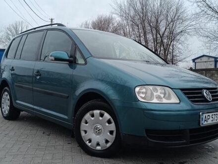 Зелений Фольксваген Туран, об'ємом двигуна 1.6 л та пробігом 259 тис. км за 5500 $, фото 1 на Automoto.ua