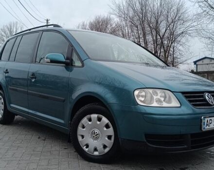 Зеленый Фольксваген Туран, объемом двигателя 1.6 л и пробегом 259 тыс. км за 5500 $, фото 1 на Automoto.ua