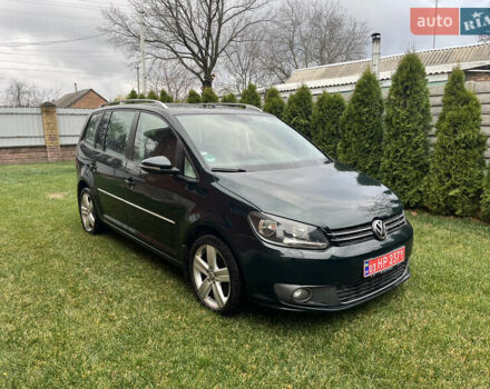 Зеленый Фольксваген Туран, объемом двигателя 2 л и пробегом 282 тыс. км за 10700 $, фото 1 на Automoto.ua