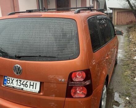 Оранжевый Фольксваген Туран, объемом двигателя 1.4 л и пробегом 221 тыс. км за 5000 $, фото 2 на Automoto.ua