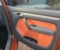 Оранжевый Фольксваген Туран, объемом двигателя 1.4 л и пробегом 110 тыс. км за 8200 $, фото 3 на Automoto.ua