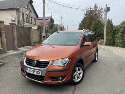 Фольксваген Туран 2007 у Кривому Розі на Automoto.ua Помаранчевий Фольксваген Туран, об'ємом двигуна 1.4 л та пробігом 229 тис. км за 6300 $, фото 1 на Automoto.ua