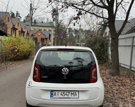 Белый Фольксваген Ап, объемом двигателя 1 л и пробегом 166 тыс. км за 6499 $, фото 2 на Automoto.ua