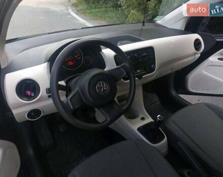 Черный Фольксваген Ап, объемом двигателя 1 л и пробегом 170 тыс. км за 5950 $, фото 1 на Automoto.ua