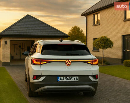 Белый Фольксваген ID.4, объемом двигателя 0 л и пробегом 65 тыс. км за 22999 $, фото 2 на Automoto.ua