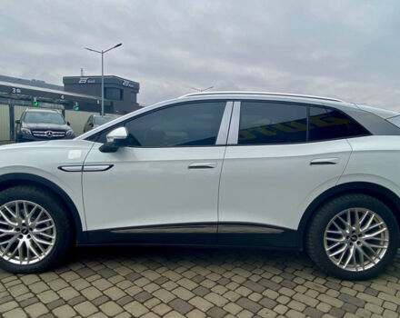 Белый Фольксваген ID.4, объемом двигателя 85 л и пробегом 25 тыс. км за 28400 $, фото 2 на Automoto.ua