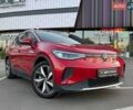 Красный Фольксваген ID.4, объемом двигателя 0 л и пробегом 24 тыс. км за 26490 $, фото 1 на Automoto.ua
