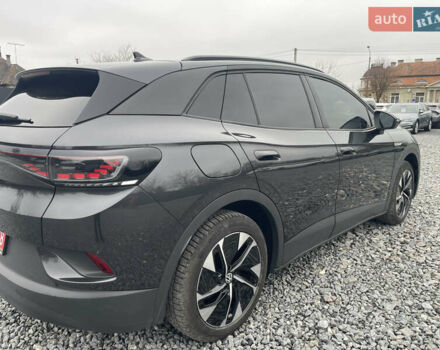 Серый Фольксваген ID.4, объемом двигателя 0 л и пробегом 128 тыс. км за 25995 $, фото 3 на Automoto.ua